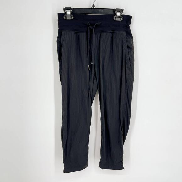 Lululemon Crop Pants Womens Sz 2 Black Rib Knit Waist Drawstring Lightweight - Picture 1 of 9